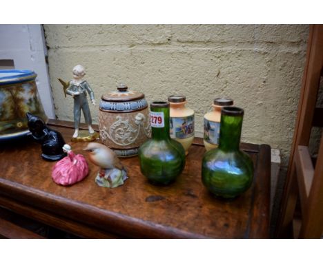 A pair of Loetz style green iridescent glass and silver mounted vases, 12.5cm high; together with a Doulton Lambeth barrel an