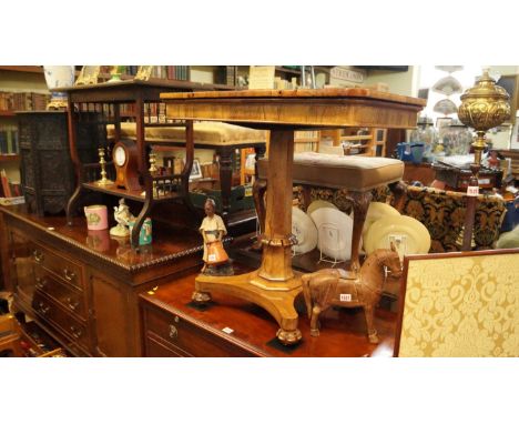 An old rosewood pedestal games table, the chequerboard inset top sliding to reveal a backgammon surface, 78.5cm wide. 