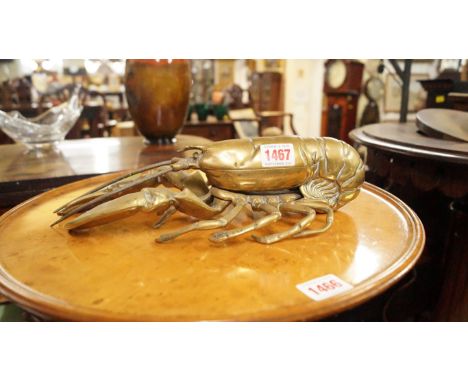 A Victorian novelty brass articulated lobster inkwell, 32cm long.
