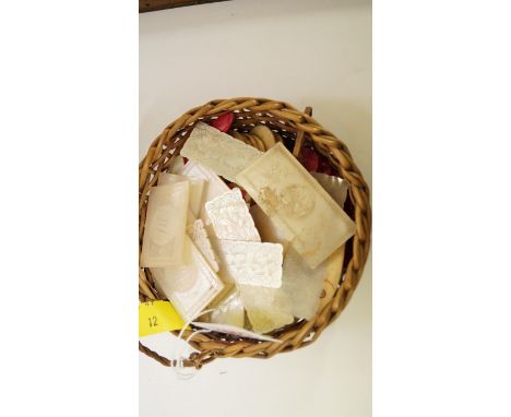 A small quantity of Chinese mother of pearl gaming counters; together with a small quantity of bone examples. 