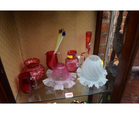 A small quantity of cranberry glass; together with two glass light shades. 