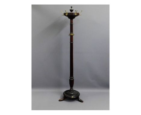 A Victorian mahogany cloak &amp; hat stand 76.5in tall x 20.5in span at base, one brass hook fitting replaced