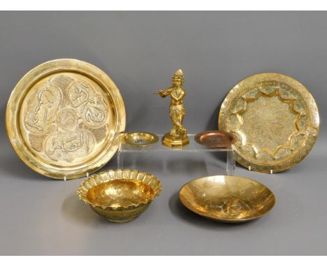 An antique Tibetan brass figure, a Chinese pin dish with enamel decor twinned with an Islamic brass tray with applied silver 
