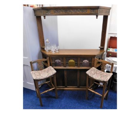 An Old Charm oak home bar with two stools, shelf rack, optics &amp; glasses supplied, 64.75in high x 62.5in wide x 15.5in dee
