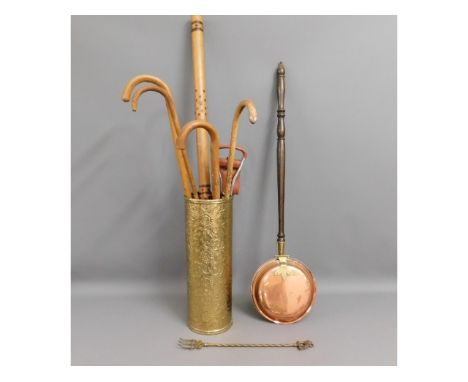 A stick stand with contents &amp; a copper warming pan