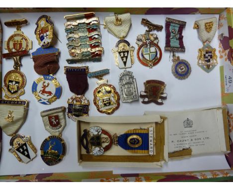 A group of 16 Masonic interest enamel and white metal medallions, including a boxed J R Gaunt Royal Masonic Institute for boy