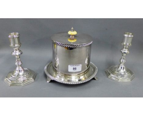 Walker &amp; Hall Epns tea caddy together with a pair of Epns knop stemmed candlesticks, (3) 