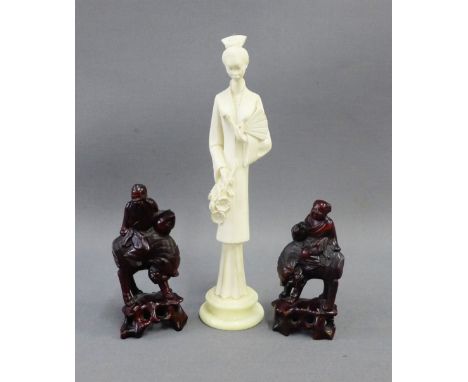Giannelli alabaster figure of a Geisha, together with two Chinese wooden Deity figures, tallest 26cm, (3) 