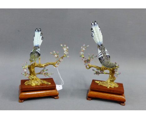 Pair of gilt metal and enamel birds on rectangular wooden plinths, 14.5cm high, (2) 