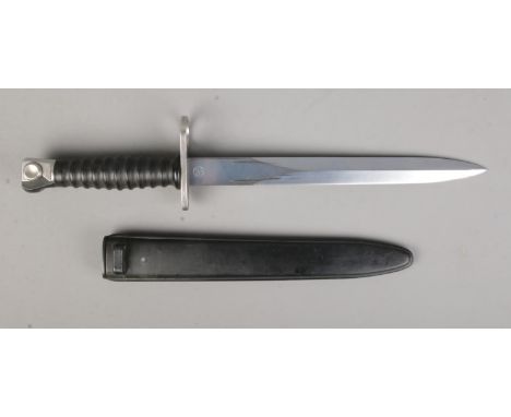 A Switzerland Model 1957 pattern bayonet with scabbard manufactured by Waffenfabrik Neuhausen, Wenger. Stamped no. 427640. CA