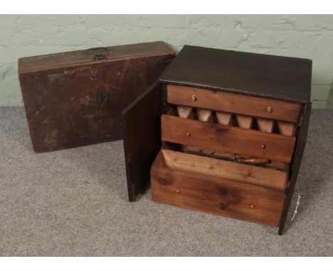 An engineers tool cabinet with to cupboard doors with three interior drawers and another tool case with monogram JH to front,