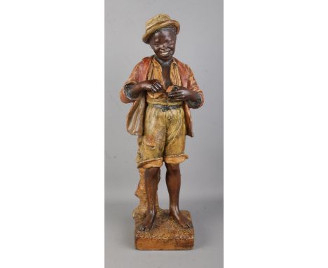 After Friedrich Siegfried Goldscheider (Czech, 1845-1897), a plaster figure titled 'Le Petit Fumeur'. Height: 60cm.