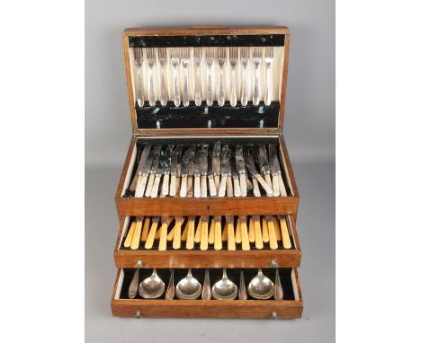 A large Viners silver plated canteen of cutlery featuring hinged top and two drawers containing fork, knives, assorted spoons