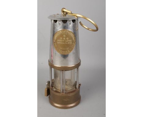 An Eccles Type 6 miners safety lamp by the Protector Lamp and Lighting Co. Ltd.