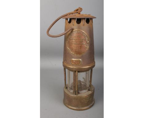 An Eccles Type SL miners safety lamp by the Protector Lamp and Lighting Co. Ltd. No. 53.
