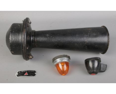 A 1927 A. Rist horn, an amber indicator and one light fitting originally for an Austin 7.