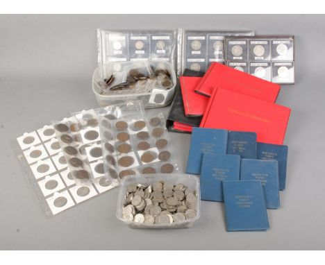 A collection of assorted British mostly pre-decimals coins to include florins, pennies, Britain's First Decimal coin packs, e