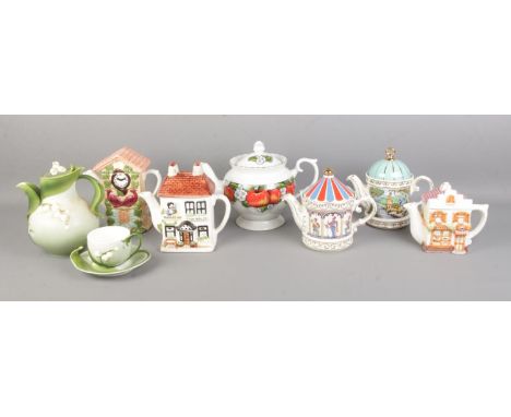 A collection of mainly novelty ceramic teapots, to include two Sadler examples 'Sporting Scenes from the 18th Century, Fishin