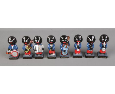 Eight ceramic Robertsons Golly musician figures to include accordion player, drummer, guitarist, etc. Notice from the the-sal