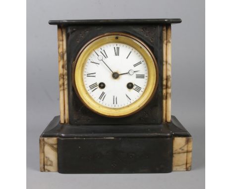 A Nineteenth Century HP &amp; Co. slate and marble mantle clock, featuring Roman Numeral markers. Chiming on a bell. Height: 