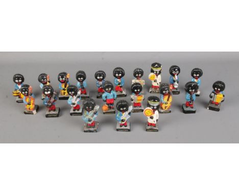 A good collection of approx. twenty Robertson's Golly figures to include musicians, lollipop lady, etc. Many are chipped, som