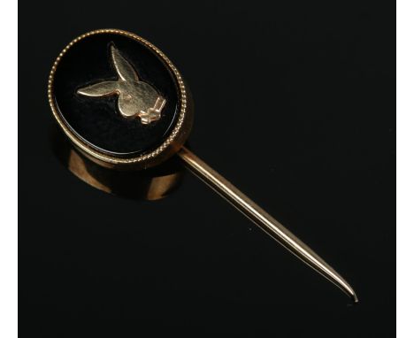 A 9ct Gold Playboy tie/stick pin. Total weight: 1.1g