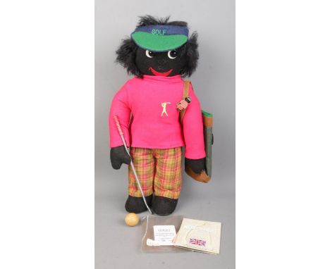 A Merrythought limited edition bear: Golly Golf Player with golf club, bag, ball and matching Golly enamel pin. Number 26 of 