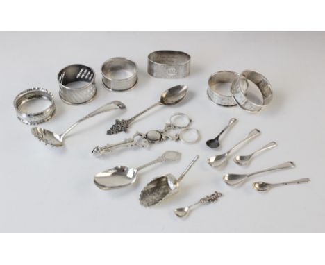 A pair of Victorian silver sugar tongs by George Unite, Birmingham 1882, 12.1cm long, together with a Victorian silver caddy 