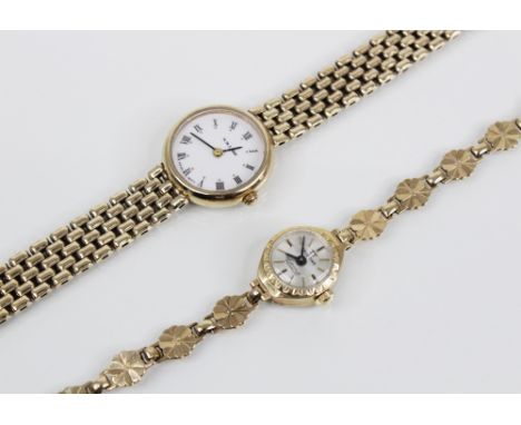 A lady's 9ct wristwatch, the round white enamel dial marked for 'N St J Paint', with Roman numerals and gold coloured dot mar