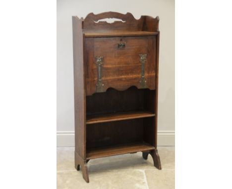 An early 20th century oak Arts and Crafts Glasgow school students bureau, the open work galleried top above a concave top she