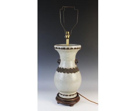 A Chinese Ge-Ware lamp base, 19th century, of baluster form and with archaic style batavian banding, vase 37cm highProvenance