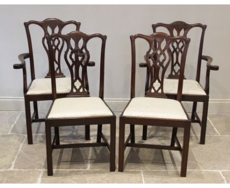 A set of eight mahogany Chippendale style dining chairs, early 20th century, each chair with an interlaced splat back above a