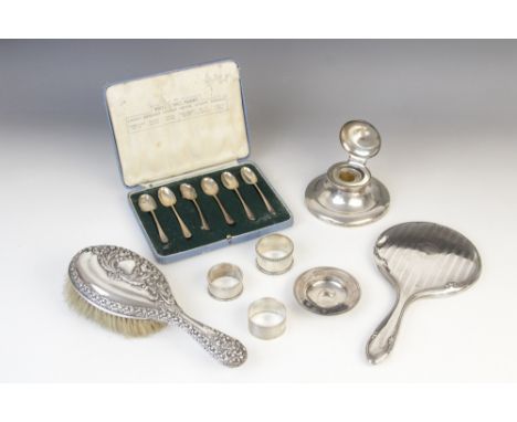 A George V silver mounted capstan inkwell by Deakin &amp; Francis, Birmingham 1925, with weighted base, hinged cover and colo