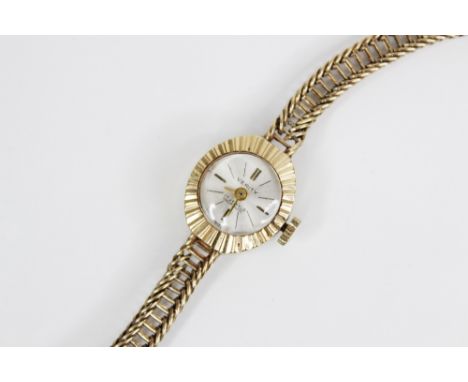 A lady's vintage 9ct gold Verity 17 jewels incabloc wristwatch, the circular silvered dial with baton markers, 11mm diameter,