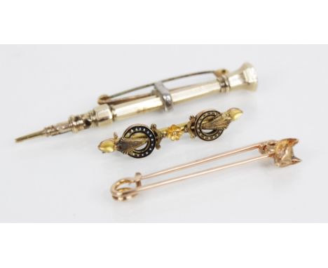 A hunting interest diamond set yellow metal brooch pin, realistically modelled as a fox head with fur effect chasing, the eye