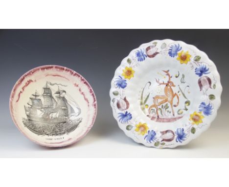 A Delft fluted bowl, 19th century, the scalloped rim hand painted with a polychrome floral border around a central panel depi