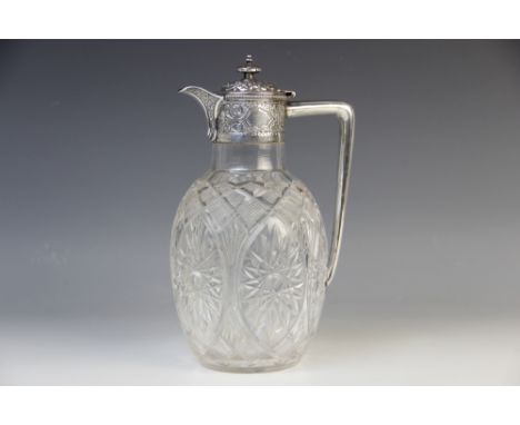 A Victorian cut glass silver mounted claret jug by Atkin Brothers, Sheffield 1897, the melon form body with hobstar cut panel