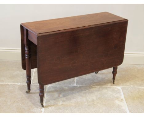 An early 19th century mahogany drop leaf dining table, the rectangular thumb moulded top raised upon ring turned legs extendi