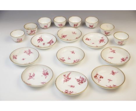 A French porcelain part tea service, 19th century, comprising eight tea bowls and nine saucers, each piece with hand painted 