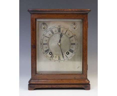 An early 20th century walnut cased Winterhalder &amp; Hofmeier eight day mantel clock, retailed by Kent of Shrewsbury, the 15