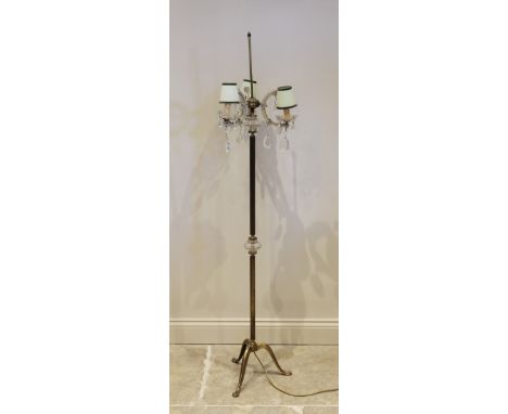 An early 20th century boudoir standard lamp, the three 'C' shaped glass branches united by a gilt metal adjustable bracket, u