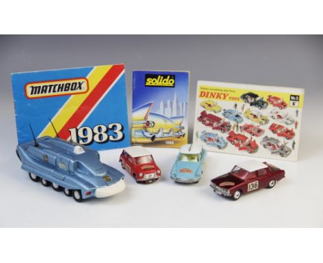 Three Corgi diecast model vehicles, comprising: a 321 Monte Carlo BMC Mini Cooper S, a 322 Monte Carlo Rover 2000 and a 323 M