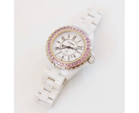 A lady's Chanel 'J12' white ceramic quartz wristwatch, the white dial with Arabic numerals, luminous hands/markers and date w