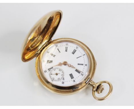 An early 20th century 14ct gold full hunter fob watch, the circular white enamel dial with Roman numerals and subsidiary seco