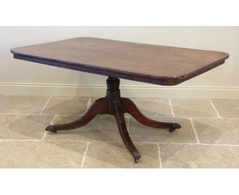 An early 19th century mahogany pedestal breakfast table, in the manner of Gillows, the rectangular crossbanded tilt top with 