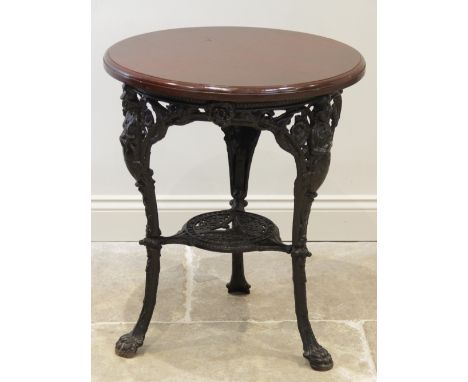 A Victorian style cast iron Britannia pub table, the circular hardwood table top raised upon three legs each cast with a figu