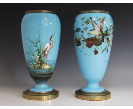 Two Aesthetic Movement brass mounted vases, late 19th century, each of inverted baluster form with beaded brass collar and pe