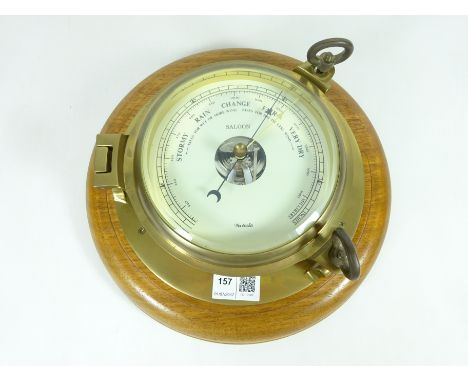 Nauticalia wall mounted barometer in the form of a porthole    Condition Report   Click here for further images, condition, a
