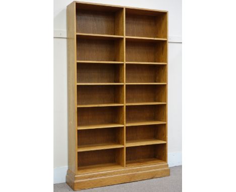 Large light oak library bookcase, plinth base, W148cm, H243cm, D37cm   Condition Report   Click here for further images, cond