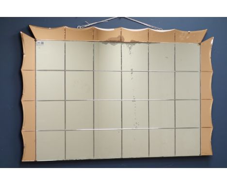 Art Deco period frameless mirror, copper tinted glass boarder, 107cm x 69cm   Condition Report   Click here for further image